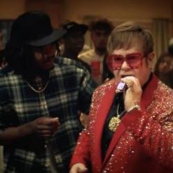 Sir Elton John in the new Snickers ad (c)