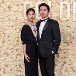 Steven Yeun and wife Joana Pak at the Golden Globe Awards
