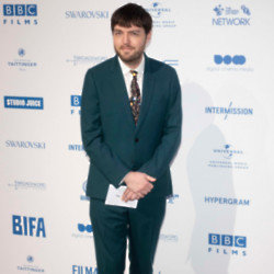 Tom Burke has reflected on changing beauty standards