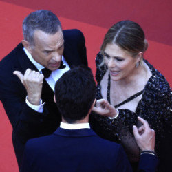 Tom Hanks’ wife has dismissed reports she and the actor had a row with a PR manager on a Cannes Film Festival red carpet