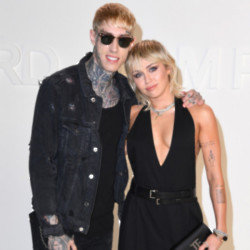 Trace Cyrus with sister Miley