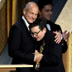 Woody Harrelson presented Michael J Fox with his award