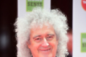 Queen’s Brian May reveals injury to ‘gluteus maximus’