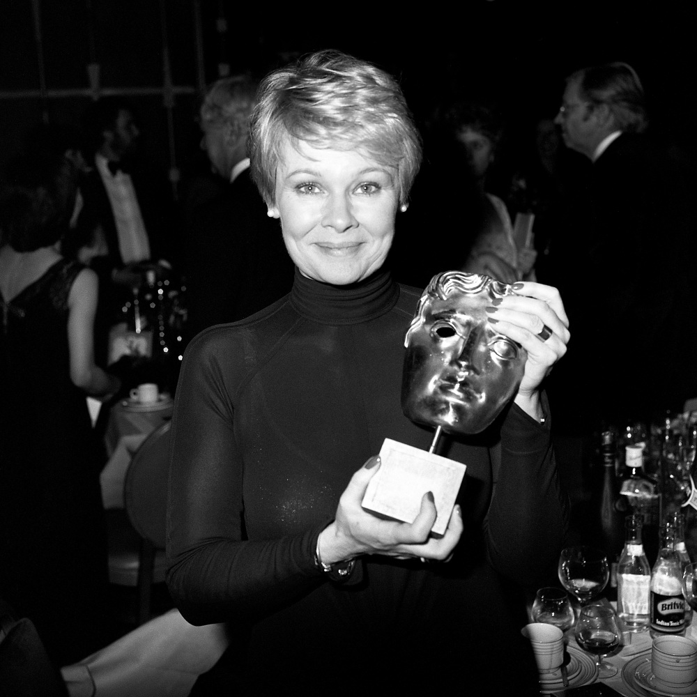 Judi Dench in 1082, with her Bafta TV award for Best Actress for 'A Fine Romance', at the British Academy of Film and TV Arts Awards