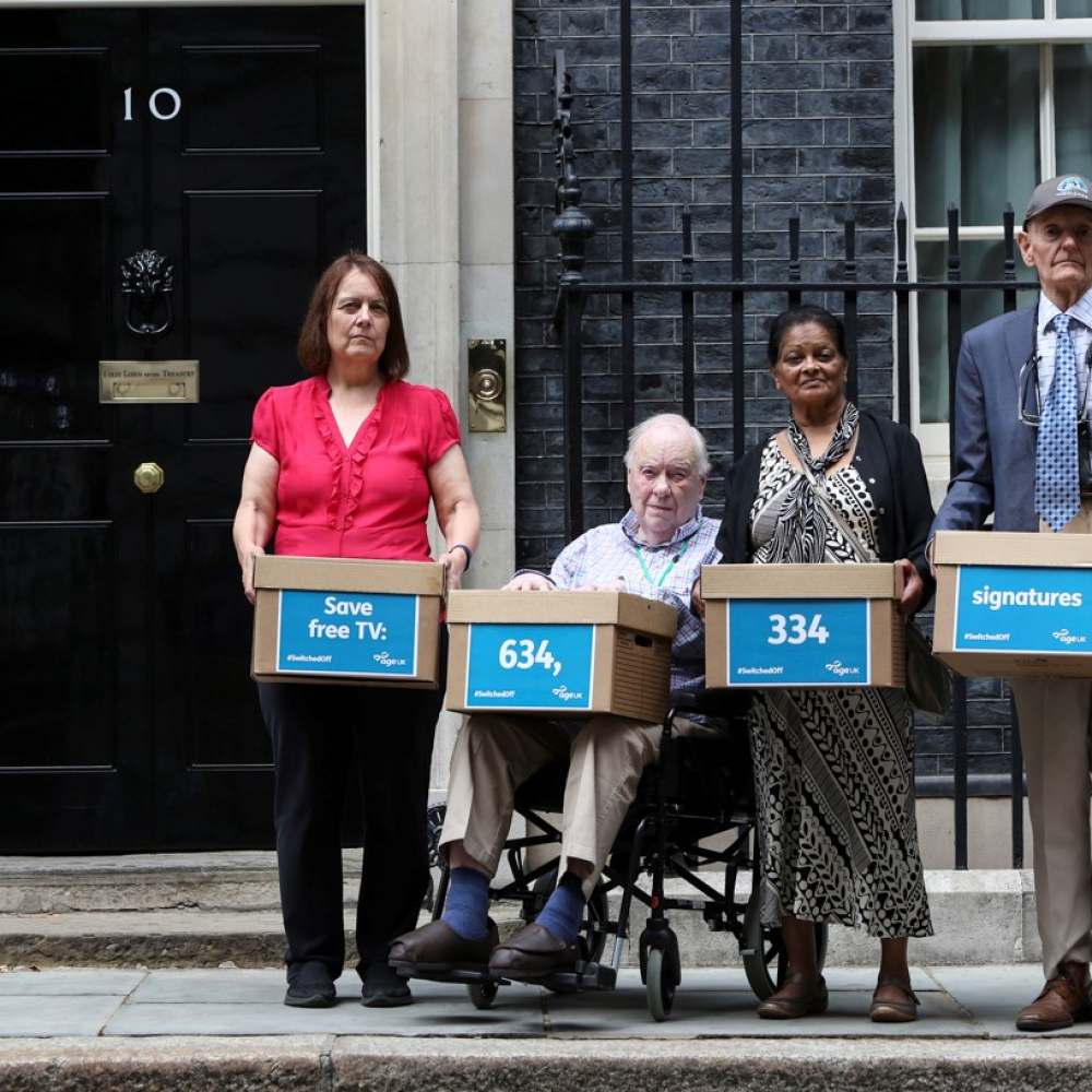 Pensioners Sue, David, Radha and Tony outside 10 Downing Street
