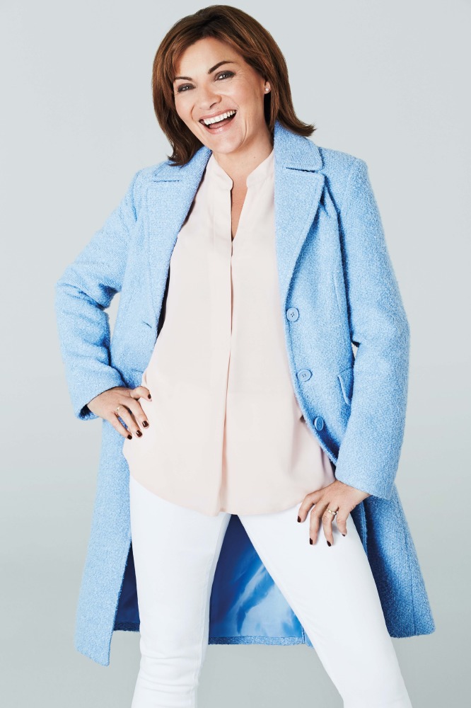 Lorraine Kelly models her first collection for JD Williams AW14; boucle coat £85, white slim leg jean £30, blouse £35