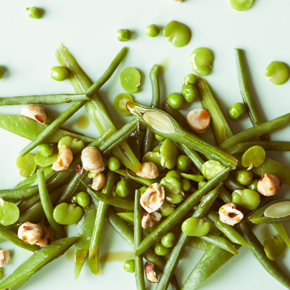 Green beans, peas, broad beans, runner beans, hazelnuts and soya sauce salad