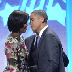 Barack and Michelle Obama (Credit: Famous)