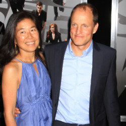 Woody Harrelson and Laura Louie (Credit: Famous)