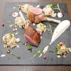 Ant Powers' lamb with pomegranate couscous, sumac labna and cucumber pickle