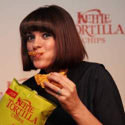 Dawn Porter opens a bag of chips