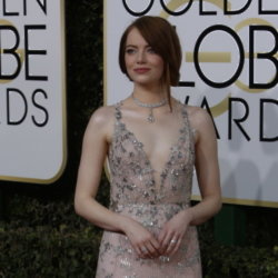 Emma Stone on the Golden Globes red carpet in Valentino