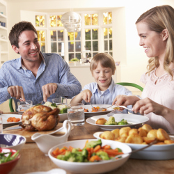 Family dinners are a good time to teach the kids to eat healthy