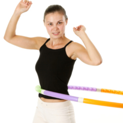 Use a hula hoop to tone your mid-section