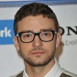 Justin Timberlake working the Geek Chic trend, vest and all