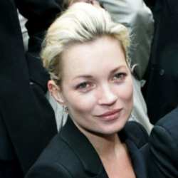 Kate Moss Keeps Her Hair Tied Back