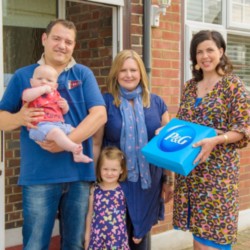 Television presenter Kirstie Allsopp (right)  presents Liza and Chris Freudmann and their children Megan, aged 3 and Lucas, aged 6 months from Ruislip