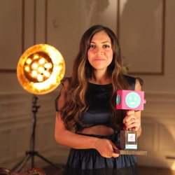 Miquita Oliver with one of the awards